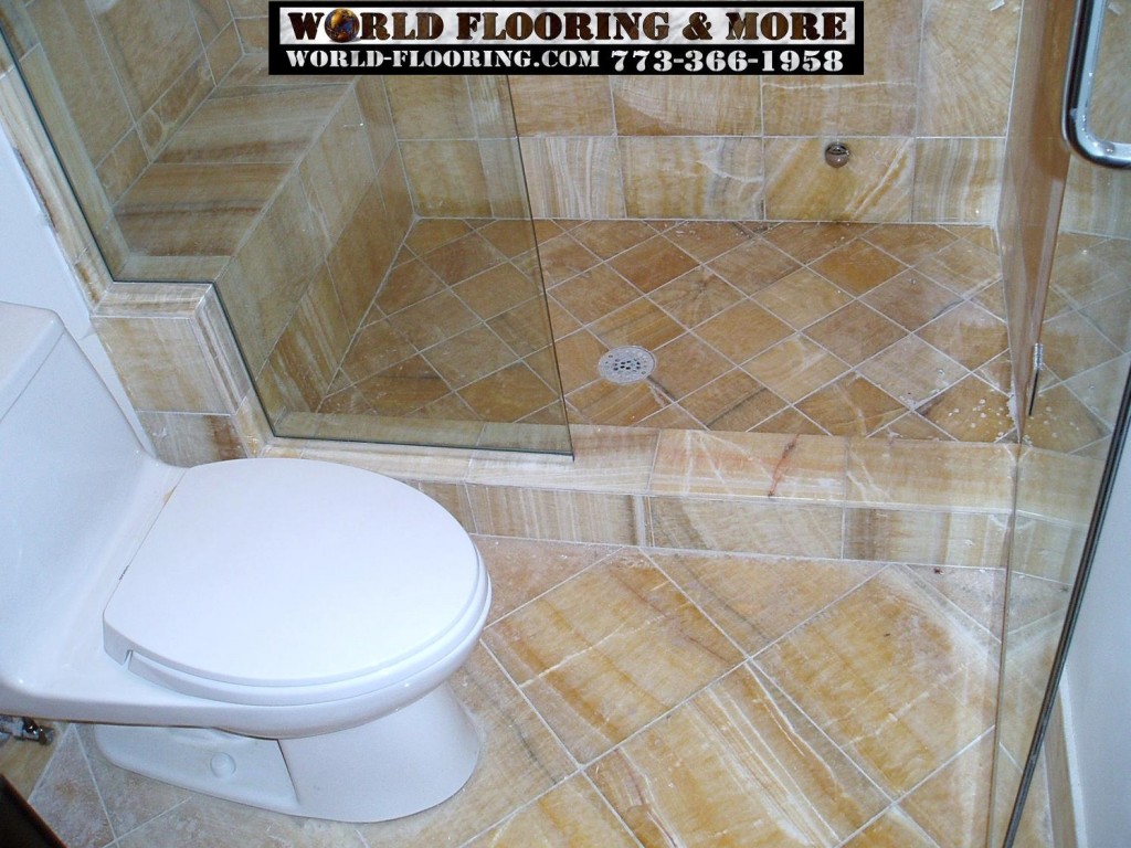 Cultured Marble shower seat raised wall by World Flooring & More 773-366-1958 Chicago Suburbs