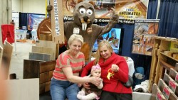 mascot with baby and grandmother