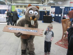 cartoon mascot with a child