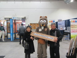 mascot taking pictures with visitors